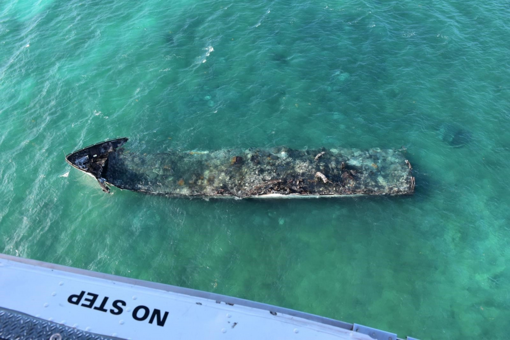 Photos: Cleanup Under Way After Yacht Burns as well as Sinks off Key West