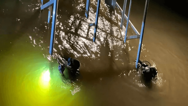 Police divers search the area around the broken gangway, Oct. 19 (Camden County Sheriff's Office)