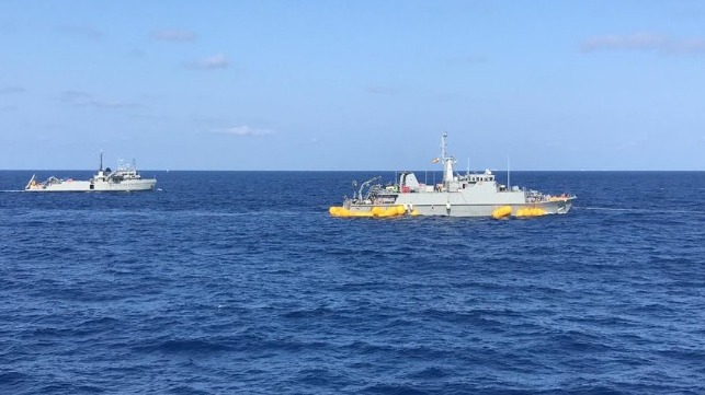 Grounded Spanish Minesweeper Refloated, Towed to Port