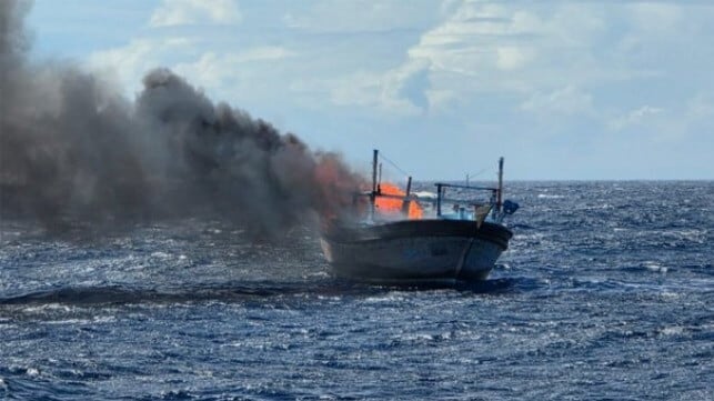 drug smuggling boat being burnt