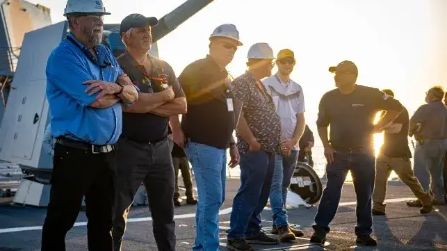 Bath Iron Works shipyard workers aboard the future USS Harvey C. Barnum Jr. (DDG 124) during sea trials, July 15 (USN file image)