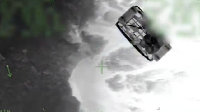 Coast Guard responders hoisted the survivor from the rocks (USCG)