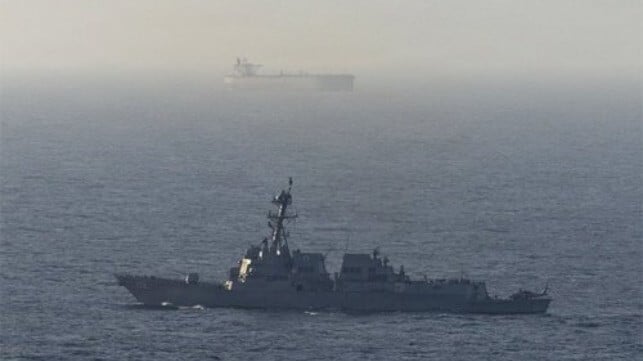 US destroyer and Iranian tanker at sea