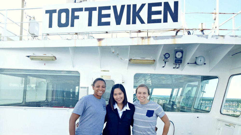 Third Officer Jonalyn Alarin Sabornido (center) pictured with the two USCG Marine Inspectors